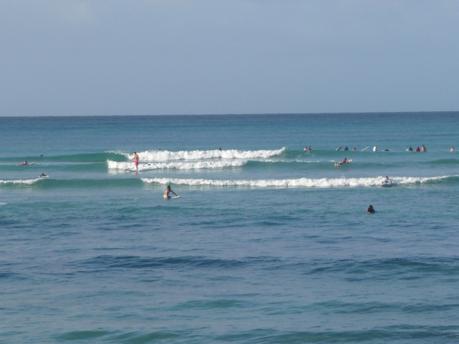Surfers have an intimate connection to waves. the creation of modern surfing has been credited to Duke ** from Hawaii. Surfing is an essential part of the culture of indigenous Hawaiins. One wonders what these modern day surfers at Waikiki beach have on their minds? 